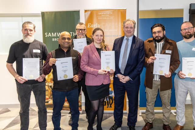 Edward Argar MP (third from right) with Kettleby Foods' apprentices Mark Taylor, Uthpala Pathiraja, Richard Graham, Judyta Solnica, Harjit Singh Turna and Tomasz Rzepecki