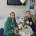 Raj Chavda, at the new dementia-friendly cafe he runs with volunteers, pictured with Melton MP Edward Argar