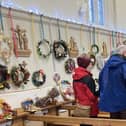 Wreaths line the walls of St John's Church, Melton, for the competition