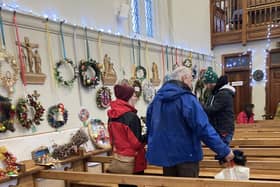 Wreaths line the walls of St John's Church, Melton, for the competition