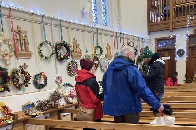 Wreaths line the walls of St John's Church, Melton, for the competition