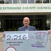 Melton Borough Council leader Joe Orson pictured at County Hall in June last year delivering a petition supporting funding for a southern link to the approved MMDR