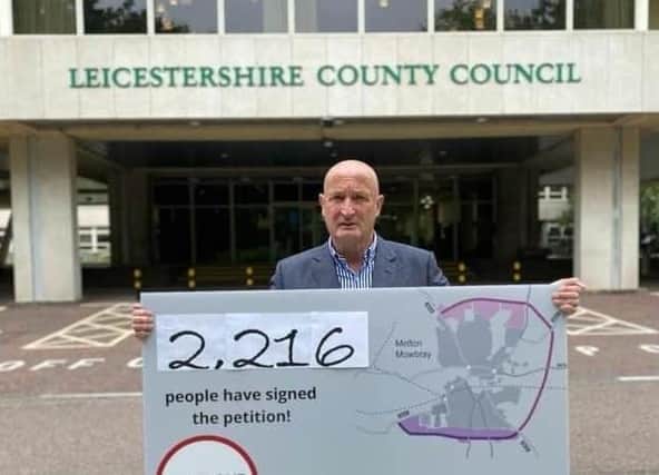 Melton Borough Council leader Joe Orson pictured at County Hall in June last year delivering a petition supporting funding for a southern link to the approved MMDR