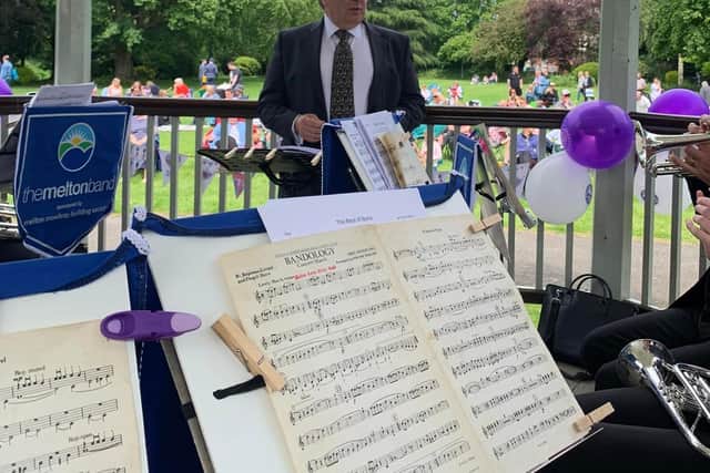 Musical Director, Tony Rifugiato, conducts The Melton Band on the town's Bandstand at the Jubilee concert last June