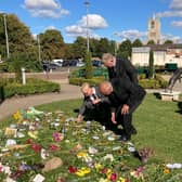 The King's county representative - the Lord Lieutenant of Leicestershire - visits Melton's floral tributes to The Queen, with the Mayor and the council's chief executive