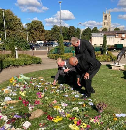 The King's county representative - the Lord Lieutenant of Leicestershire - visits Melton's floral tributes to The Queen, with the Mayor and the council's chief executive