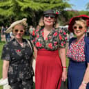 Three women dressed in period clothes at this year's 1940s Melton Mowbray event