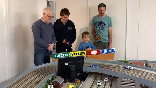 A family slot car session organised by Melton & District Model Club