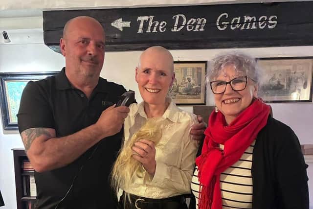 Sara Greenwood pictured after her head shave with friends Barry and Teresa