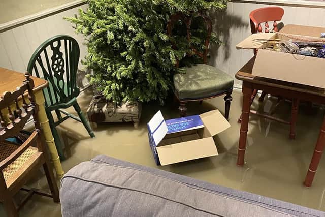 Floodwaters inside the Crown and Plough at Long Clawson