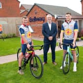 Duncan Carrier (left) and his son Wilf Carrier (right) with Bellway Sales Manager Kenny Lattimore