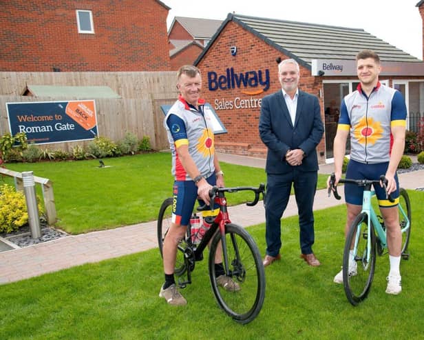 Duncan Carrier (left) and his son Wilf Carrier (right) with Bellway Sales Manager Kenny Lattimore