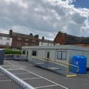 The portable building in the Burton Street car park which has administered the Covid vaccines since the summer