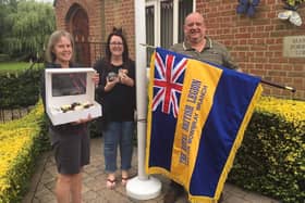 Nick Pridden, treasurer of the Melton Mowbray branch of the Royal British Legion, takes delivery of the new standard
