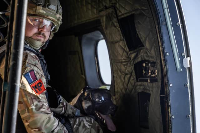 The RAF Police Military Working Dog Section in RAF Akrotiri taking part in a Puma flight to hone their skills as Dog Handlers
