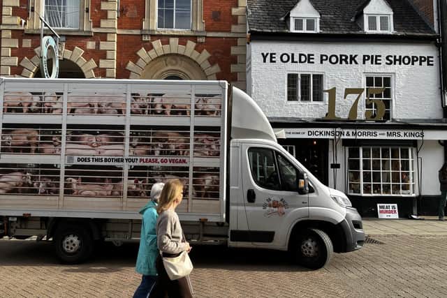The PETA campaign truck outside the Dickinson and Morris pork pie shop in Melton