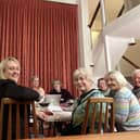 Wymondham WI committee members planning their group's centenary celebrations