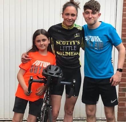 Victoria Betts takes a break from her triathlon training, with son Luke and daughter Lilith