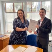 Adam Tate receives his Prime Minister's Points of Light award from Melton MP, Alicia Kearns