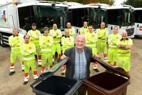 Melton Borough Council leader Joe Orson pictured with bin collection teams employed by contractor, Biffa