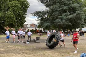 The tyre flip race at Power in the Park