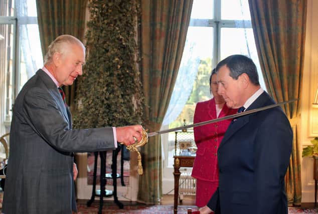 King Charles III makes Charles Richards a KCVO in a ceremony at Sandringham