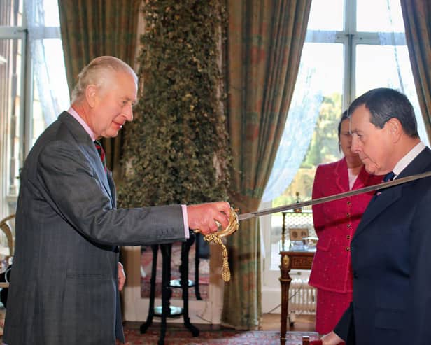 King Charles III makes Charles Richards a KCVO in a ceremony at Sandringham