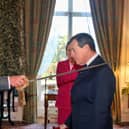 King Charles III makes Charles Richards a KCVO in a ceremony at Sandringham