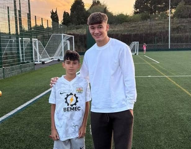 Thaime with Will Alves after the Leicester City star made a surprise visit to him at training