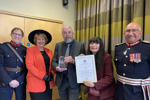Christine Slomkowska and Patrick McCracken, of 103 The Eye, show off their King's Award at the presentation with Lord Lieutenant of Leicestershire Mike Kapur (right) and Deputy Lord Lieutenants Penny Coates and Dave Andrews
