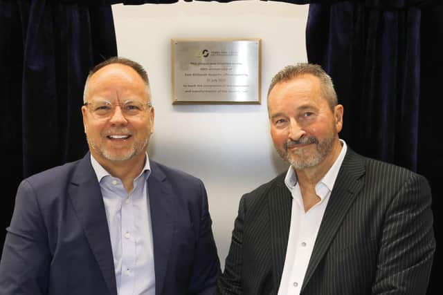 EMA MD Steve Griffiths is joined by Terry Dyer, son of the airport’s first MD Terry Dyer, to unveil a plaque marking the completion of work to expand and transform the security hall