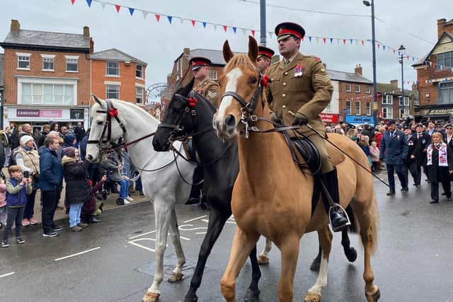 Mounted service personnel taking place in a recent Melton Mowbray Remembrance Sunday parade