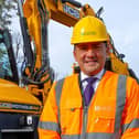 Councillor Hamilton-Gray with the pothole machine being trialled