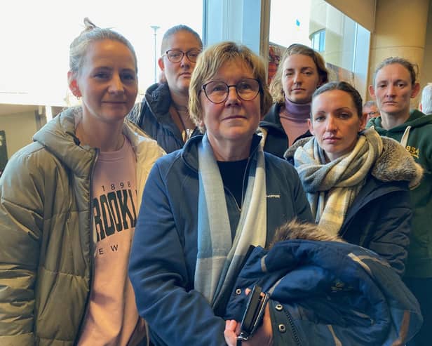 Jenny Smith (front, centre) with other netball players who are unhappy with plans to cut the sports hall space at Melton Sports Village