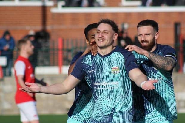 Kairo Edwards-John scores for Melton at Eastwood. Photo by Scott Messom.