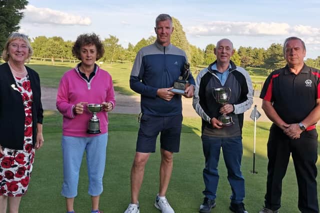 Pictured are Lady Captain Joan Allen, Nancy Denny, Ben Turner, Guy Rayson and Men's Captain Mick Jordan.
