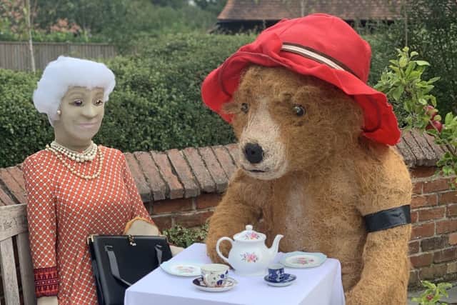The Queen has tea with Paddington Bear at Hickling Scarecrow Festival