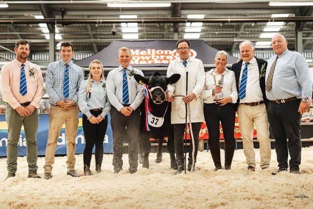 Supreme Champion Suzie, pictured with owners and judges, at Beef Expo 2026 at Melton market