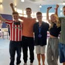 MV16 head Nicki Dartnell with students on A-level results day