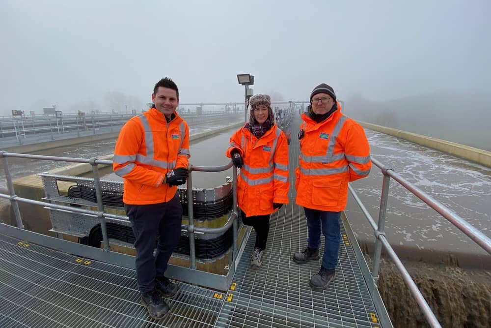 Severn Trent Water employees overlooking the aerated sludge plant - one of the new features at Melton Sewage Treatment Works installed as part of a £39M upgrading of the site