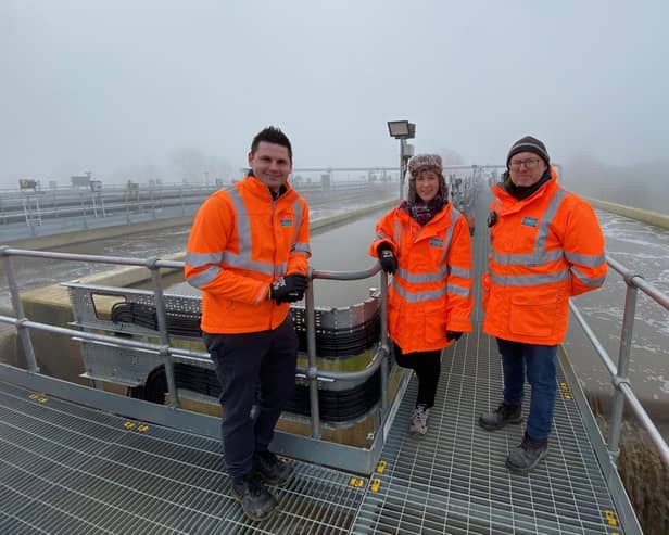 Severn Trent Water employees overlooking the aerated sludge plant - one of the new features at Melton Sewage Treatment Works installed as part of a £39M upgrading of the site
