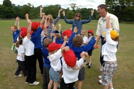 Darren Bicknell with youngsters at a recent session organised by The Belvoir Education & Sports Trust