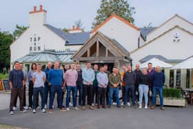 Firefighters from West Bridgford station pictured back at the Tap and Run pub this week