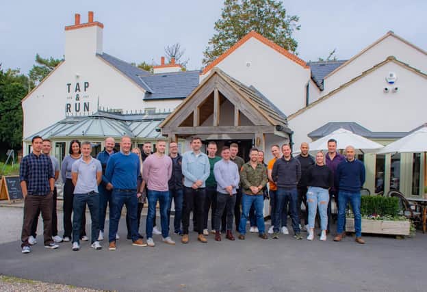 Firefighters from West Bridgford station pictured back at the Tap and Run pub this week