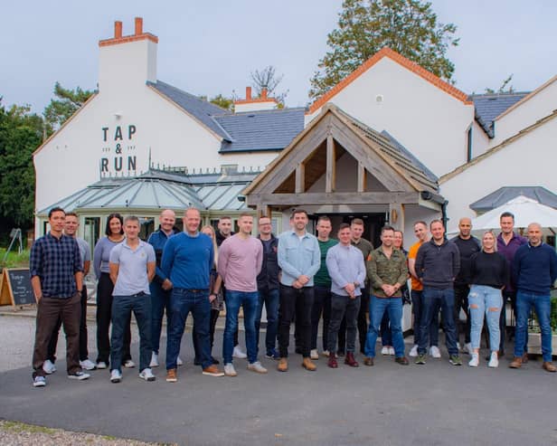 Firefighters from West Bridgford station pictured back at the Tap and Run pub this week