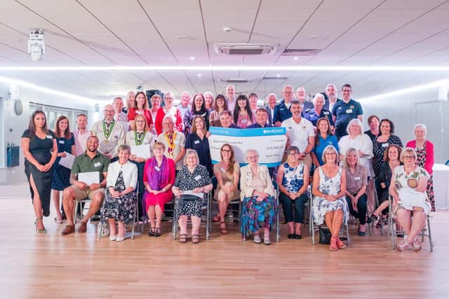 Recipients with their cheques and certificates at the presentation evening for the Ragdale Hall Community Chest
PHOTO Adam Shaw (www.adam-shaw.co.uk)