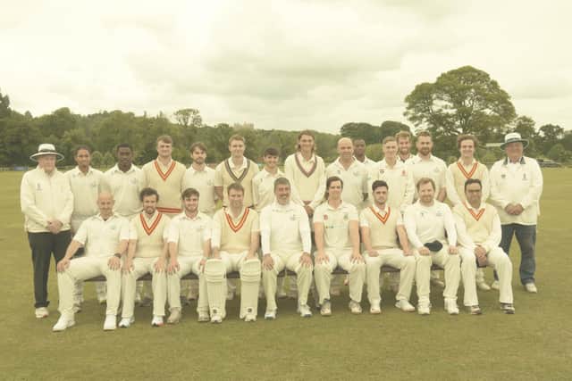 The two teams and umpires prepare for action.