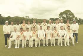 The two teams and umpires prepare for action.