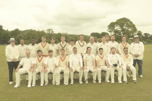 The two teams and umpires prepare for action.