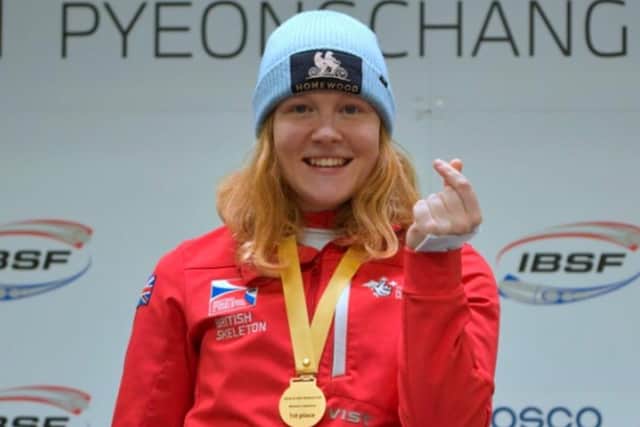 Amelia Coltman with her World Cup gold medal last weekend.